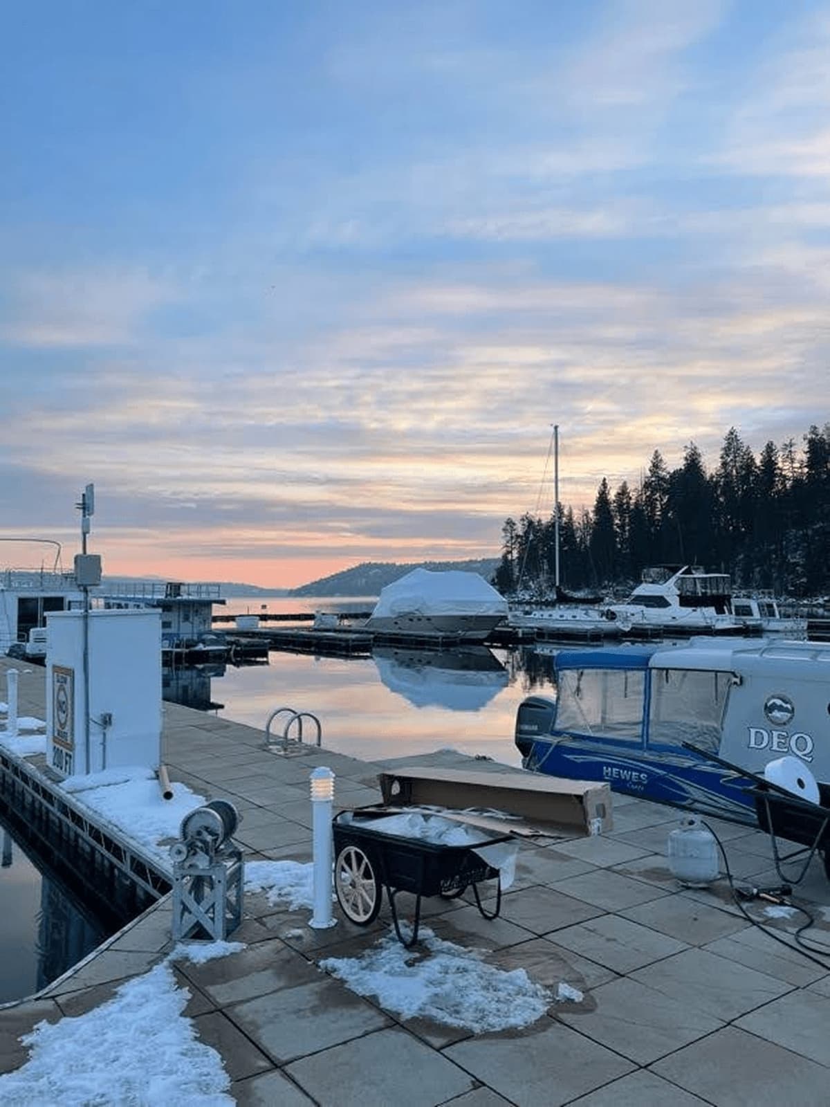 Boat under shrink wrap at marina dock